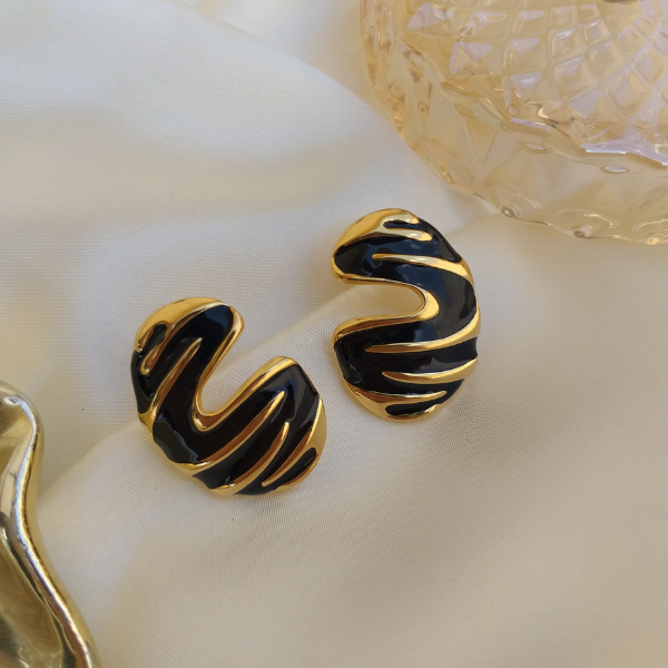 Aretes Betún