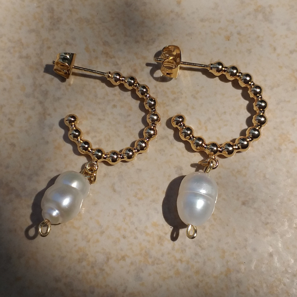 Aretes perla de río