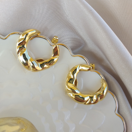 Aretes NY
