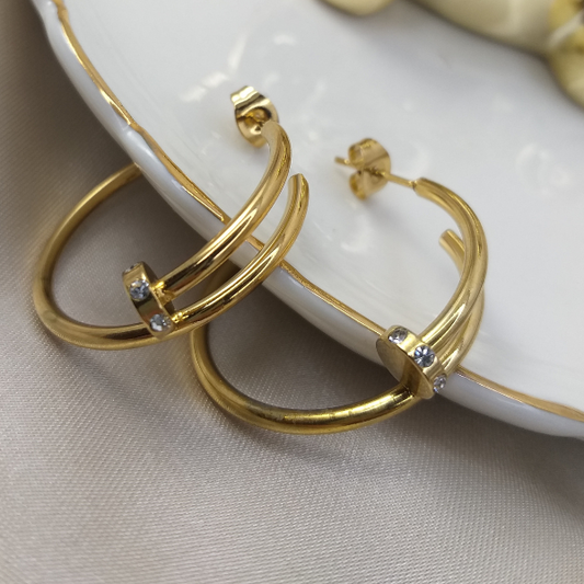 Aretes clavo