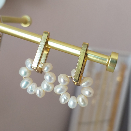 Aretes con perlita de río