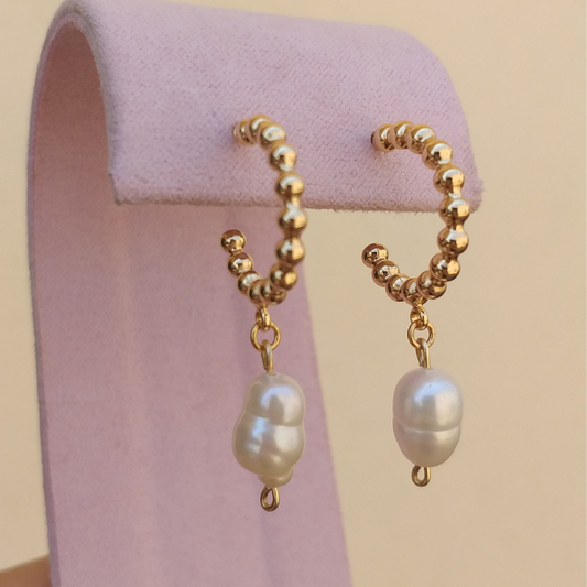 Aretes perla de río